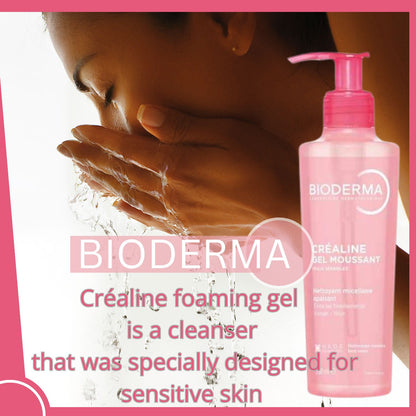 Bioderma foaming gel bottle with a woman washing her face, on a pink background.
