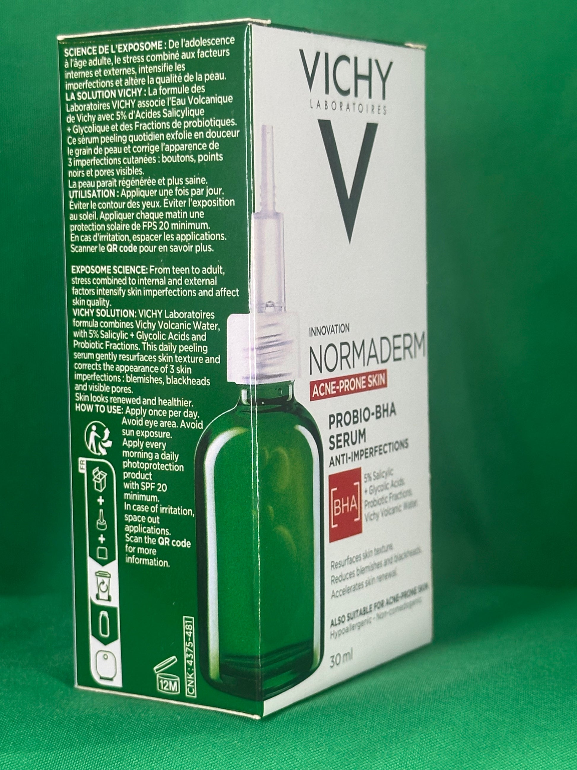 Vichy Normaderm packaging on a green background